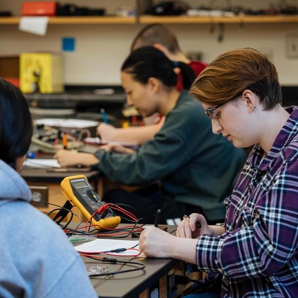 students working in a physics lab